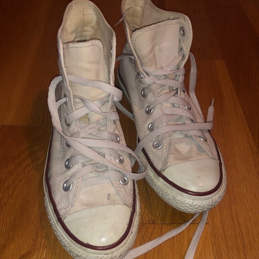 Worn white high top converse!